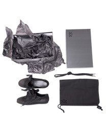 K-Two Studios Sash Flats black shoes displayed with packaging, dust bag, and accessories.