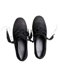 A pair of black suede lace-up shoes shown from a top-down view on a plain white background.